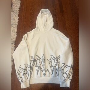 White sweatshirt with rhinestones. Very comfortable and soft.